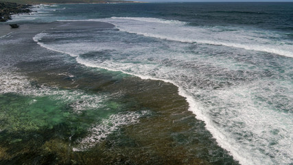 Aerial Drone Images Grace Town waves crashing over Rocks Perth Western Australia 