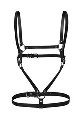Subject shot of a simple black leather harness made of straps with rivets, steel rings and buckles....