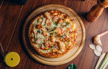 Seafood Italian Pizza on wooden table