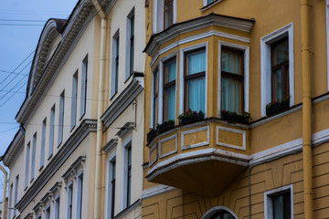 Fototapeta na wymiar Beautiful old facade with an unusual balcony