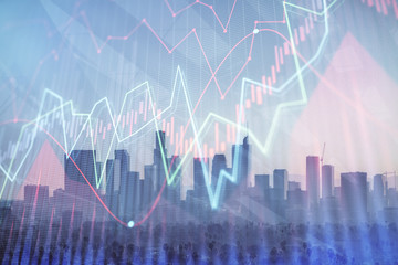 Forex chart on cityscape with skyscrapers wallpaper double exposure. Financial research concept.