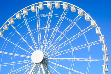 ferris wheel on blue sky