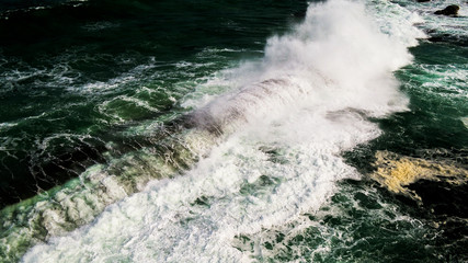 Aerial Drone Images Grace Town waves crashing over Rocks Perth Western Australia 