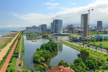 Fototapeta premium Top view of the embankment and modern buildings in Batumi. Georgia is a country at the junction of Europe and Asia and attracts many tourists from all over the world. The concept of a tourist site.