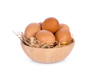 eggs in wooden bowl isolated on white background