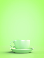 Green mug with saucer on a green background. With copyspace.