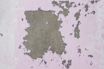 pink background the texture of the cracked paint resembles a shell