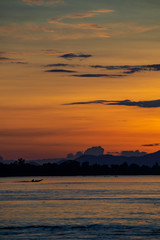 Fototapeta na wymiar sunset over the lake laos