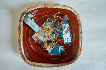 Chernihiv region, Ukraine, April 26, 2019. Old oxidized microcircuits and printed circuit boards...