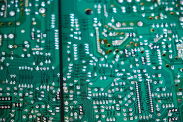 Chernihiv region, Ukraine, April 25, 2019. Green computer circuit board as a background. Chip.