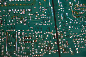 Chernihiv region, Ukraine, April 25, 2019. Green computer circuit board as a background. Chip.