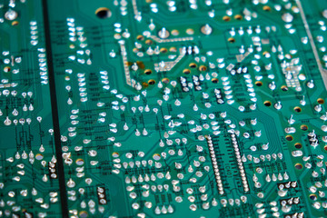 Chernihiv region, Ukraine, April 25, 2019. Green computer circuit board as a background. Chip.