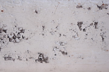 white wall with paint, scuffs and old white