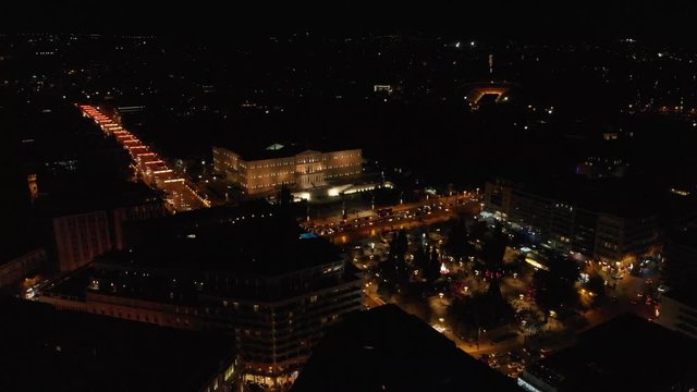 Syntagma square by night aerial drone shot from far