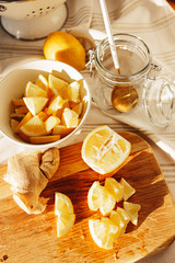 Honey, lemon and ginger on old wooden table