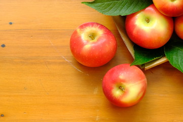 New Zealand apple on wooden background