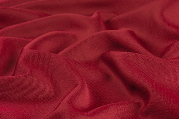 Red fabric background texture.Red cloth. 