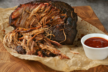 a piece of pulled pork with sauce