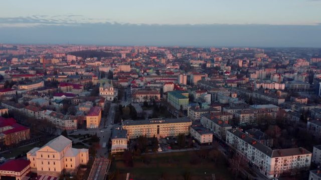 Top view of sunset over city near lake. Ternopil, Ukraine. Lake Ternopil.