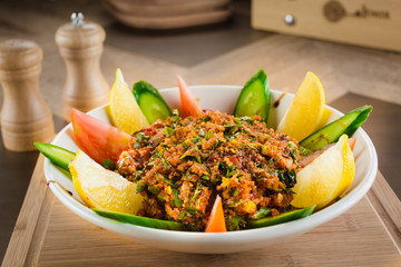 Couscous with parsley, tomato, lemon and olive oil. Traditional Arabic Salad Tabbouleh. top view