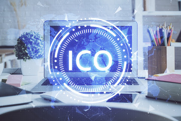 Multi exposure of blockchain and crypto economy theme hologram and table with computer background....