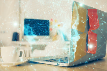 Double exposure of work space with computer and human brain drawing hologram. Brainstorm concept.