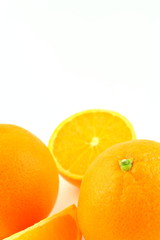 fresh orange fruits isolated on a white background with copy space