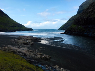Fototapeta premium Faroe Islands Beach with black Sand and Stones - Landscape Photography