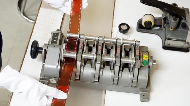 Synchronous film for post industrial film production with 35mm film strip and editing, vintage look