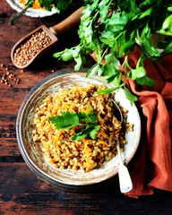 Buckwheat stew with vegetables in a ceramic bowl. rustic