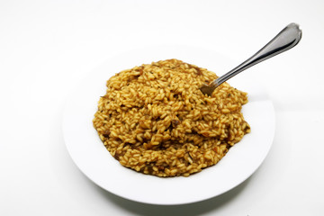 Risotto with mushrooms in white background
