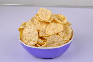 indian snack jeera papad or fryums in bowl