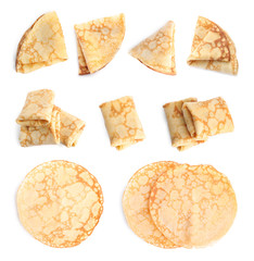 Set of delicious thin pancakes on white background, top view