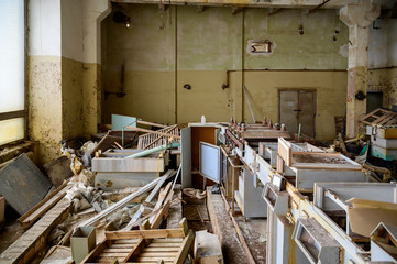 Obraz na płótnie Canvas Photo of garbage indoors on the ruins of a slum plant