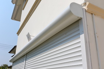 white roller shutter door closed security in modern house