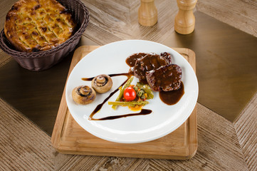 Stir fry meat with vegetable served and french fries