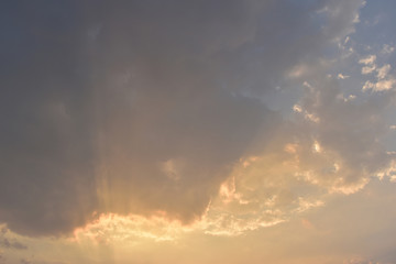 Fototapeta na wymiar golden light rays of sunset sky background