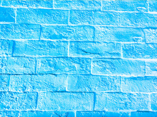 Blue retro brick wall surface. Soft blue colored wall background.