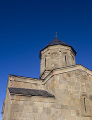 Fototapeta na wymiar Georgia - old orthodox church in mountain 