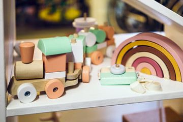 Wooden toys in pastel shades. Plastic free, according to the Montessori method, for the development of thinking and logic