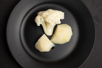 cooked cauliflower dish with potatoes