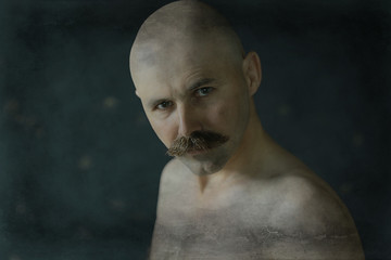 Fototapeta na wymiar vintage hipster mustache, portrait of a man with a long mustache, unusual look