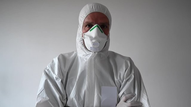 Operator equipping himself to perform tests to detect covid19 virus