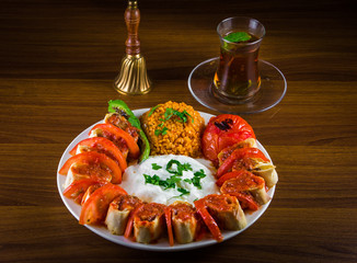 Turkish Beyti Kebap garnished with vegetables