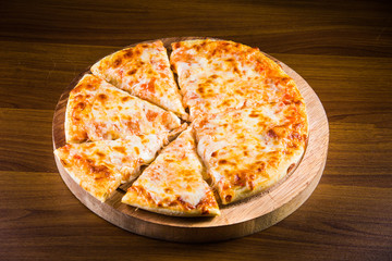 Hot Turkish pide pizza closeup on a wooden table. horizontal top view