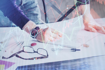 Multi exposure of man standing and planing investment with stock market forex chart.