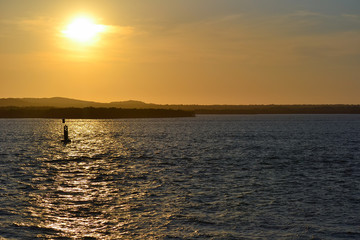 Obraz premium sea view at sunset in golden hour
