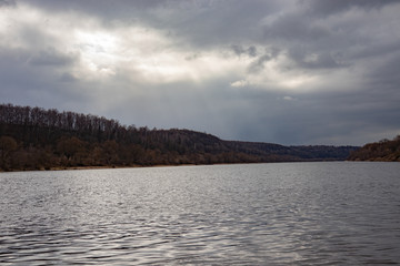 View of the Oka River in Russia in the spring in cloudy weather, beautiful river landscape.