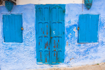 Traditional moroccan door in blue town Chefchaouen, Morocco.