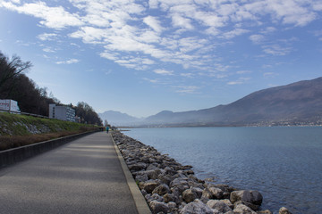 sports activity road on lake natural mountain coast panoramic view